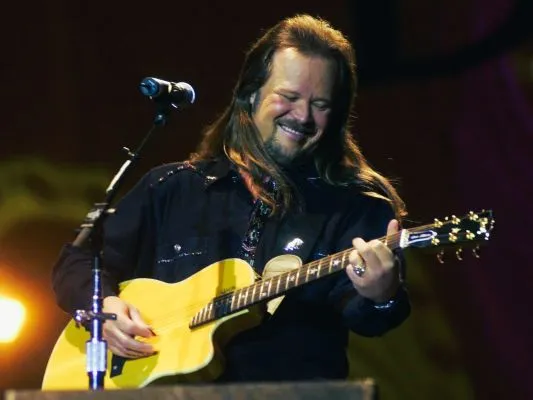 spelling songs - Travis Tritt